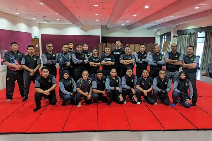 Group photo of Malaysian Immigration officers with Jeet Academy KL instructors after a training session in Port Dickson