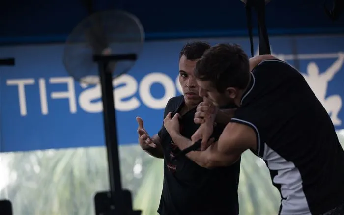 Two members practising a Krav Maga wrist-control technique