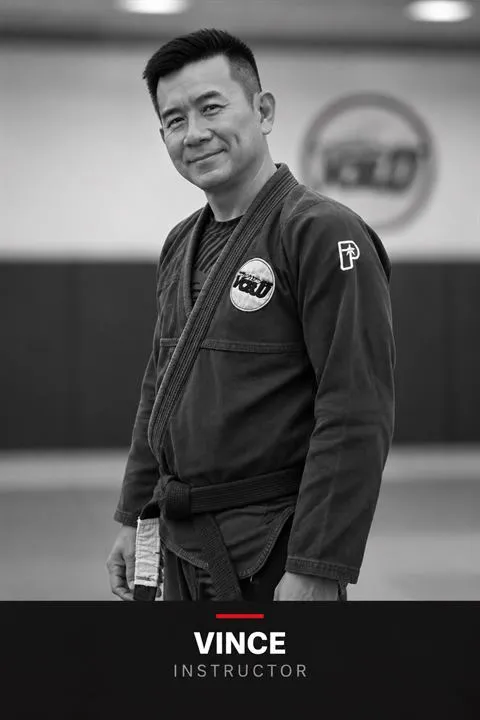 Black-and-white portrait of Vince Choo, Brazilian Jiu-Jitsu instructor at JEET Academy KL
